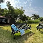 Stone House Bezze By Stayvista With Lake View, Jacuzzi & Lawn - Your Perfect Getaway