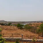 Stone House Bezze By Stayvista With Lake View, Jacuzzi & Lawn - Your Perfect Getaway