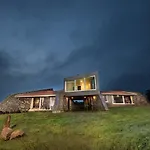 Stone House Bezze By Stayvista With Lake View, Jacuzzi & Lawn - Your Perfect Getaway