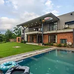 Saffronstays Elysium