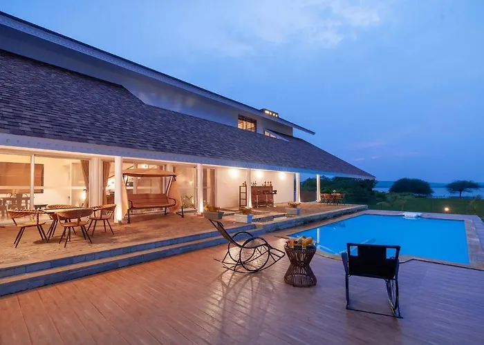 Stayvista\'S Eva Villa - Lakeside Luxury With Modern Decor, Pool & Expansive Lawn - Near Sula