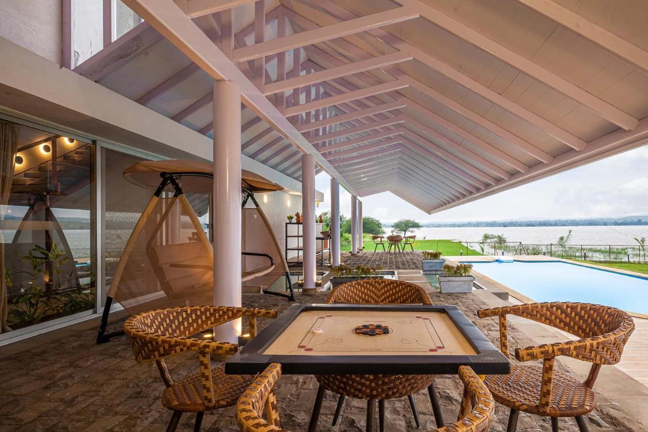 Stayvista's Eva - Lakeside Luxury With Modern Decor, Pool & Expansive Lawn - Near Sula