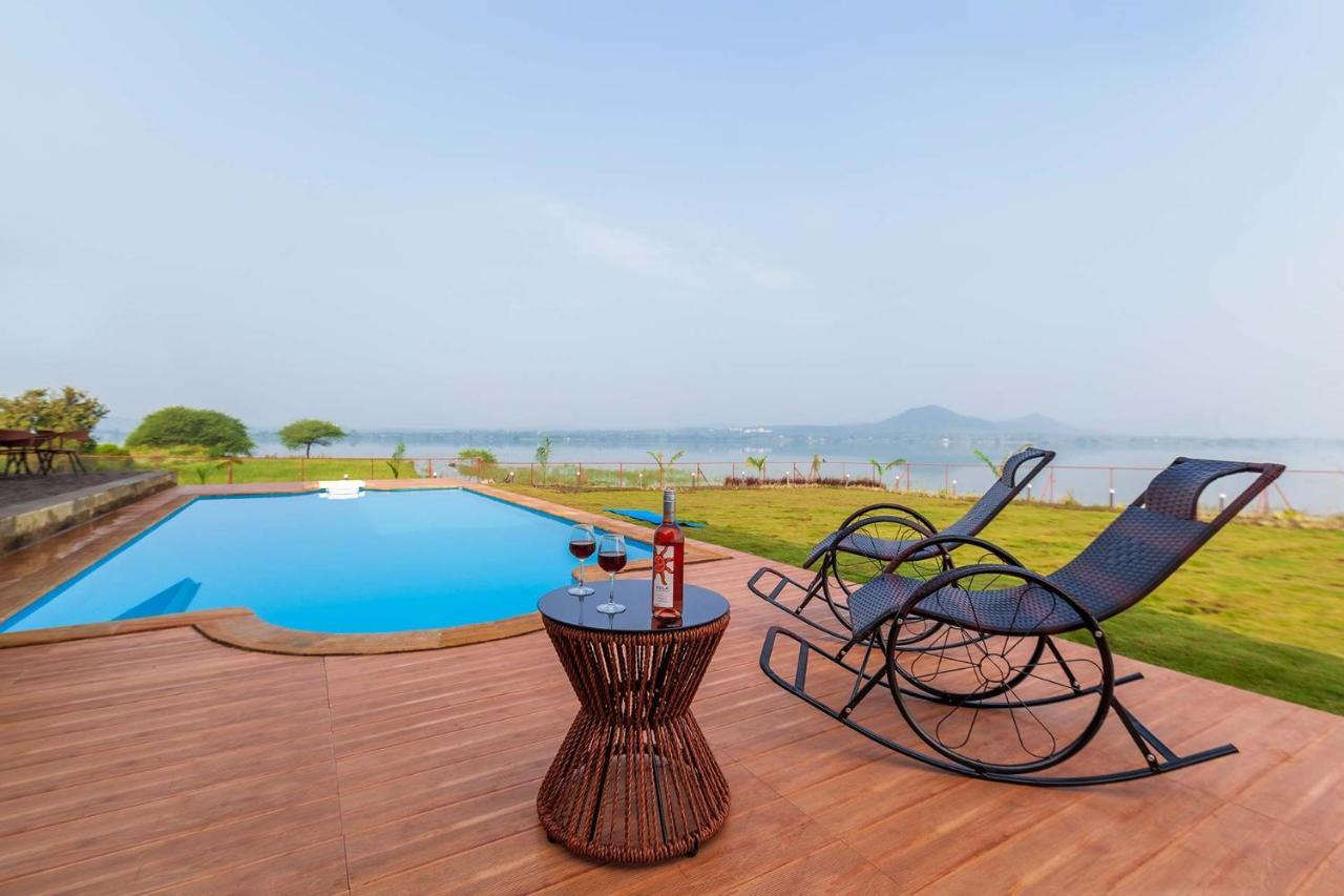 Stayvista's Eva - Lakeside Luxury With Modern Decor, Pool & Expansive Lawn - Near Sula *
