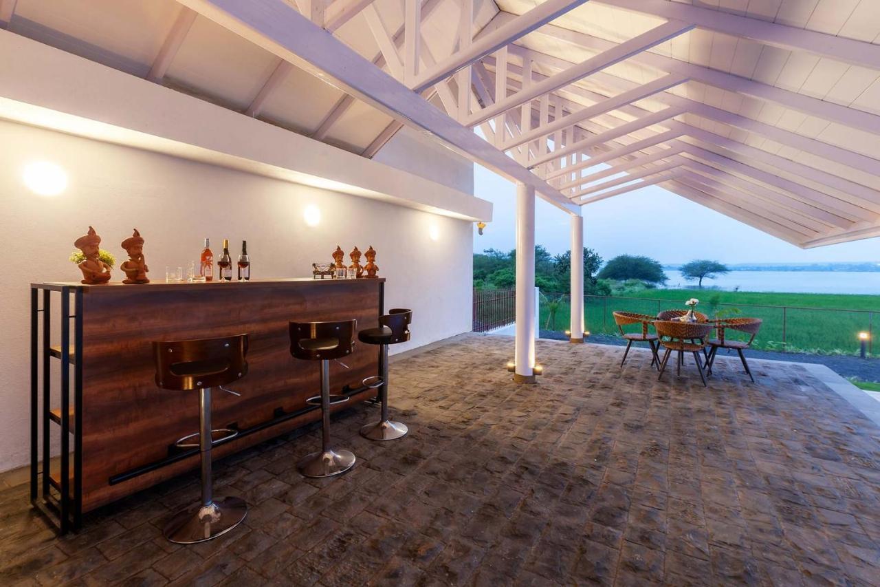 Stayvista's Eva - Lakeside Luxury With Modern Decor, Pool & Expansive Lawn - Near Sula Villa *