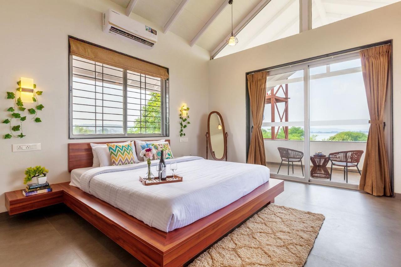 Stayvista's Eva - Lakeside Luxury With Modern Decor, Pool & Expansive Lawn - Near Sula Nashik
