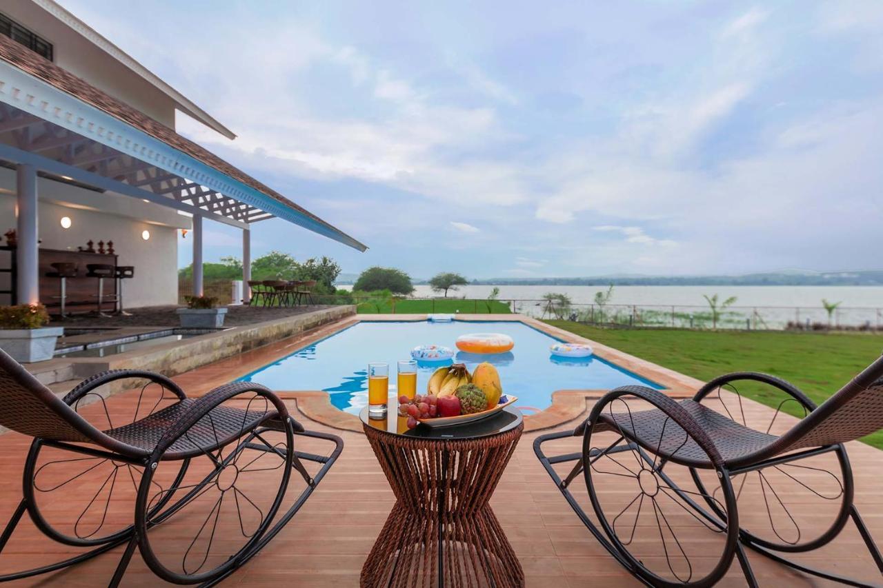 Stayvista's Eva - Lakeside Luxury With Modern Decor, Pool & Expansive Lawn - Near Sula Villa Nashik