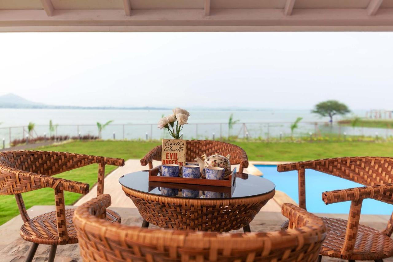 Villa Stayvista's Eva - Lakeside Luxury With Modern Decor, Pool & Expansive Lawn - Near Sula