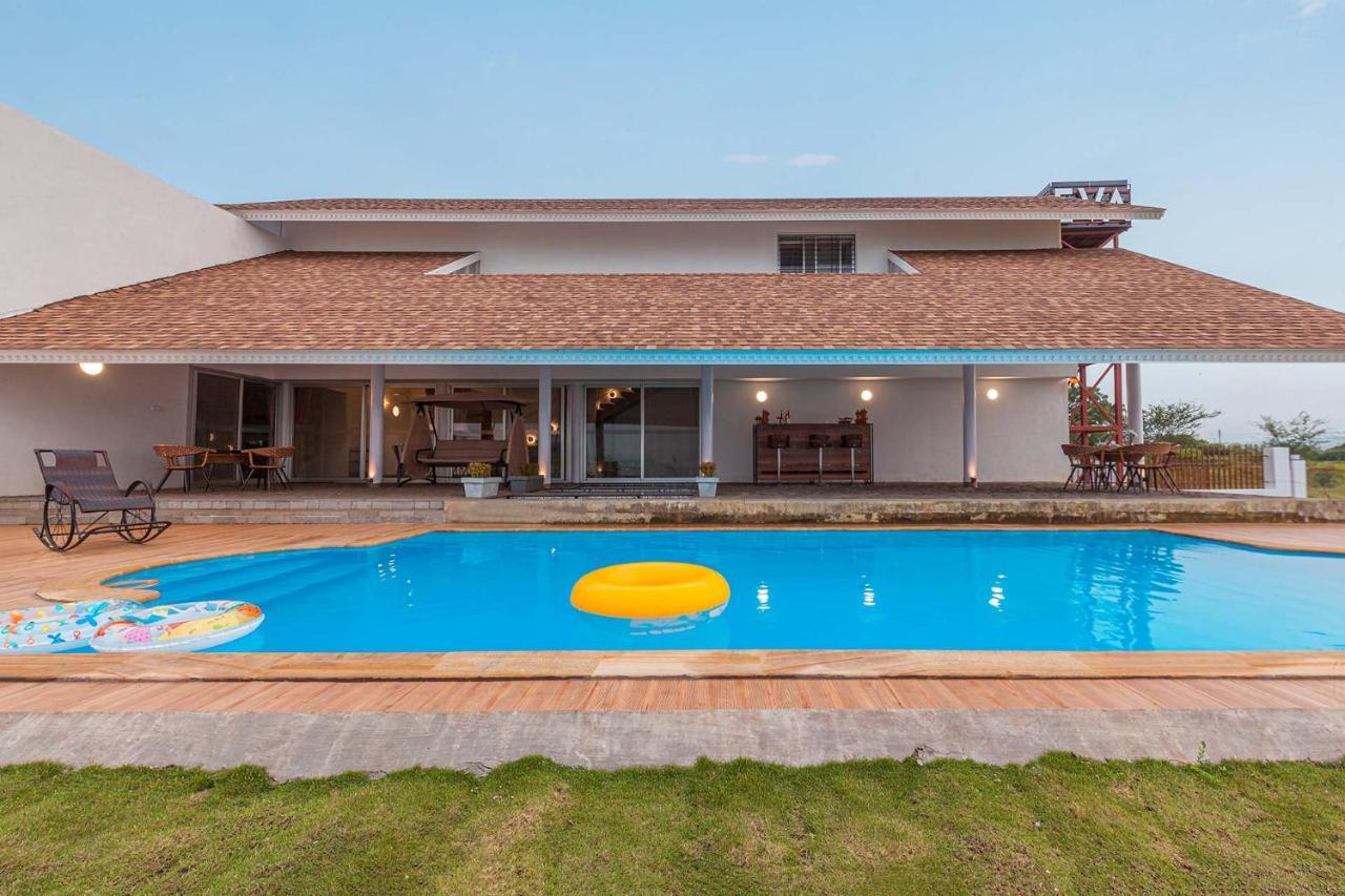 Villa Stayvista's Eva - Lakeside Luxury With Modern Decor, Pool & Expansive Lawn - Near Sula