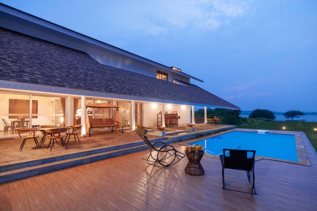 Stayvista's Eva - Lakeside Luxury With Modern Decor, Pool & Expansive Lawn - Near Sula Villa *