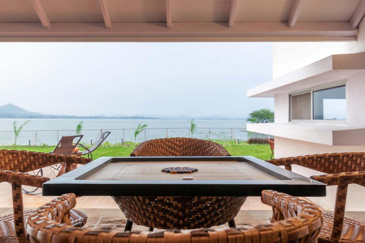 Stayvista's Eva - Lakeside Luxury With Modern Decor, Pool & Expansive Lawn - Near Sula