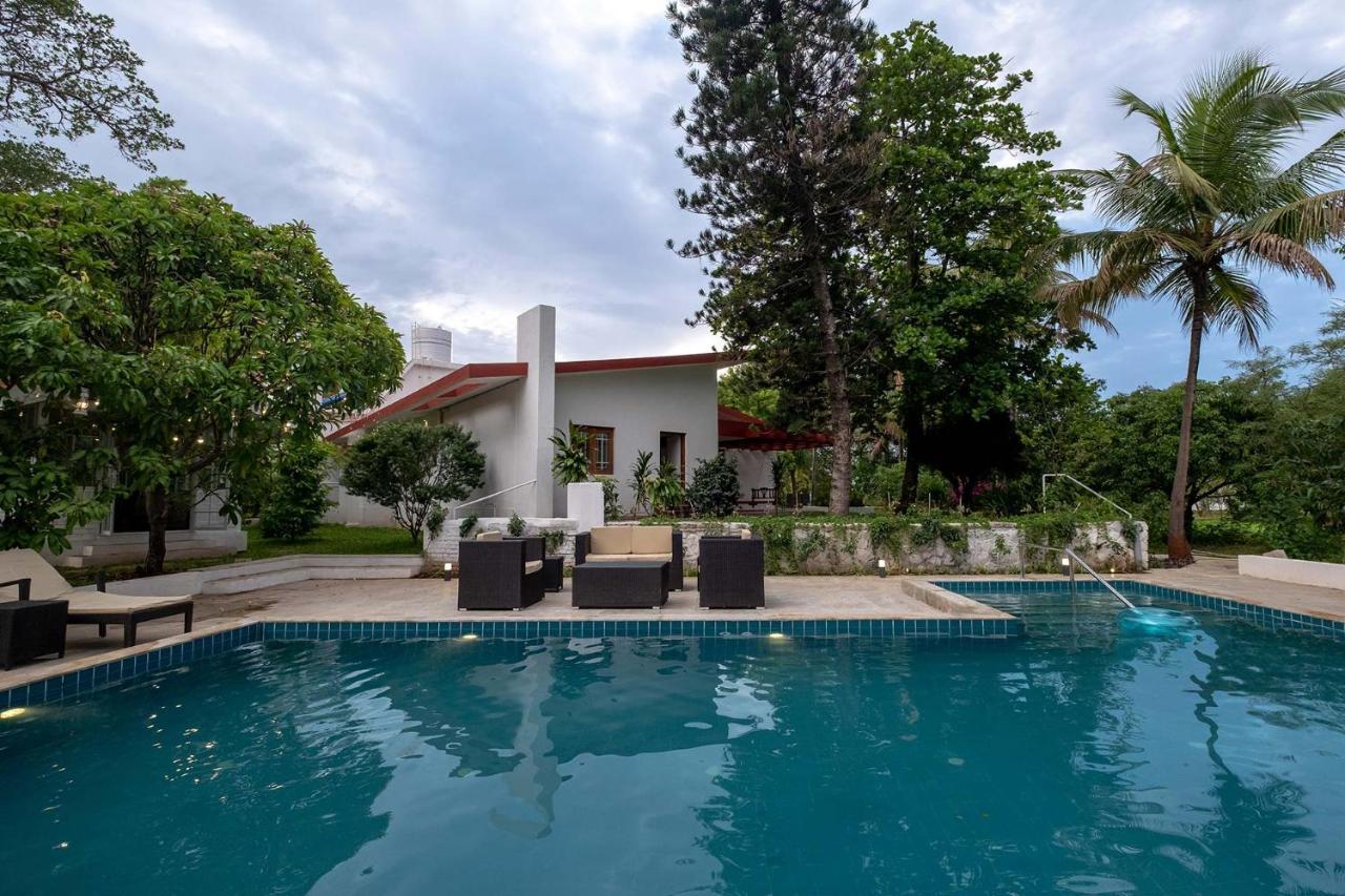 Stayvista's Villaggio - Orchard Oasis With Pool, Expansive Lawn, Patio & Indoor Activities *