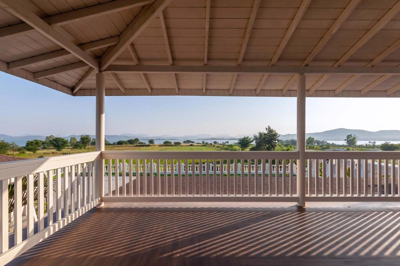 Stayvista's La Vie: Tranquil Lakeside With Pool And Farmland Views * Nashik