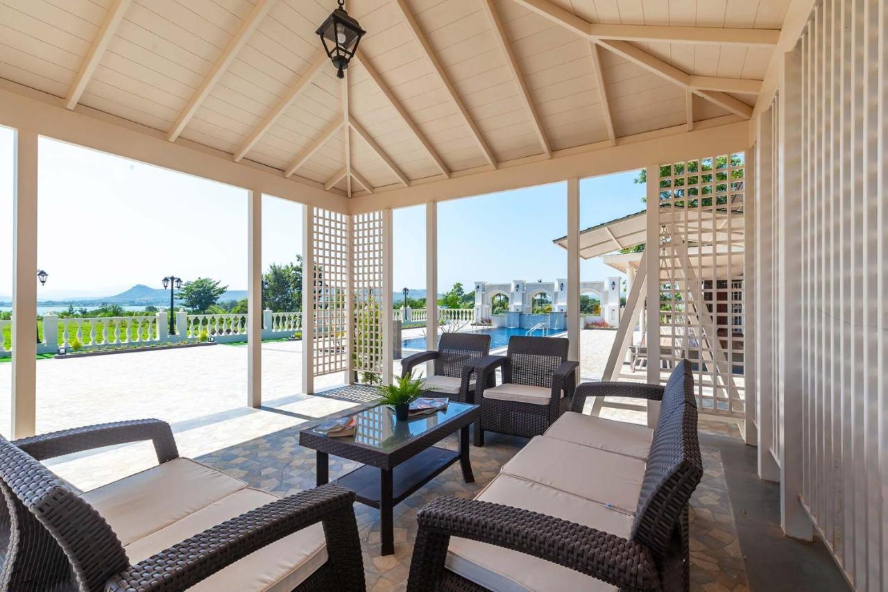 Villa Stayvista's La Vie: Tranquil Lakeside With Pool And Farmland Views