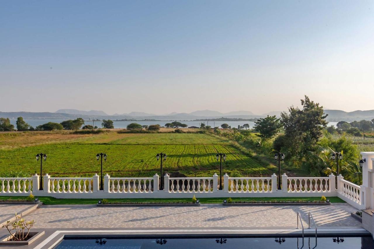 Villa Stayvista's La Vie: Tranquil Lakeside With Pool And Farmland Views *
