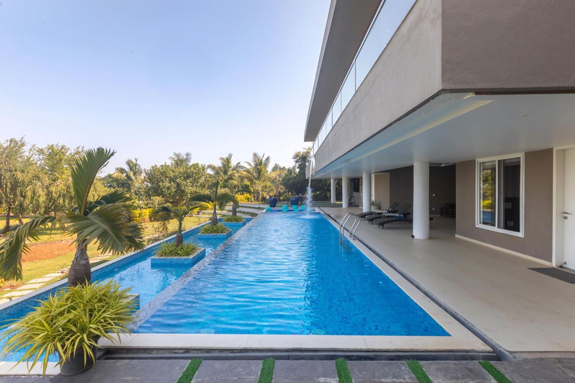 Stayvista's Watermark - Hillside Lakeview Retreat With Infinity Pool, Garden & Terrace - Near Nashik's Vineyard Haven Villa
