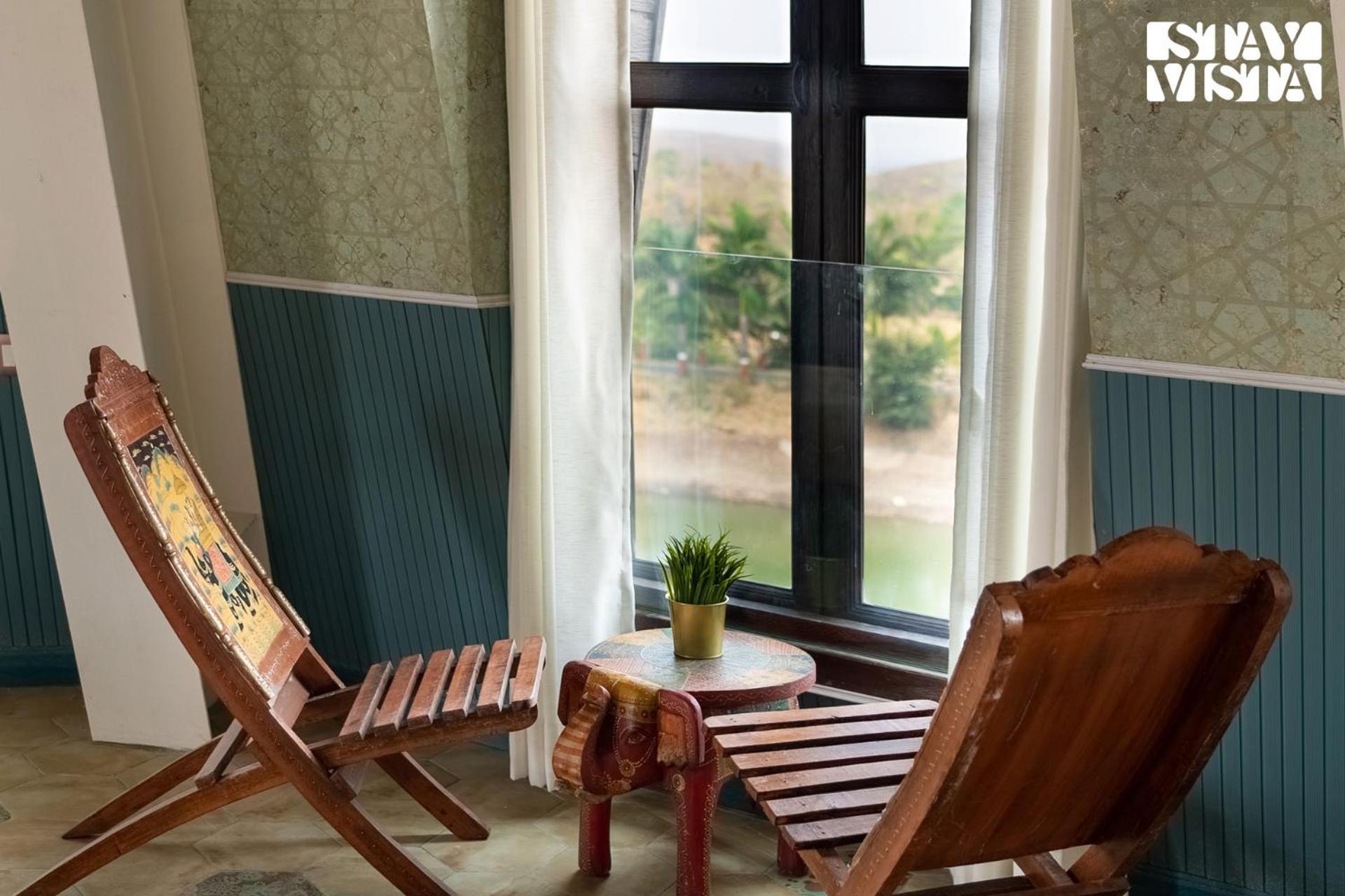 Villa Stayvista's Cerenity Castle - Lakeside Haven With Hill-view, Terrace & Indoor Entertainment