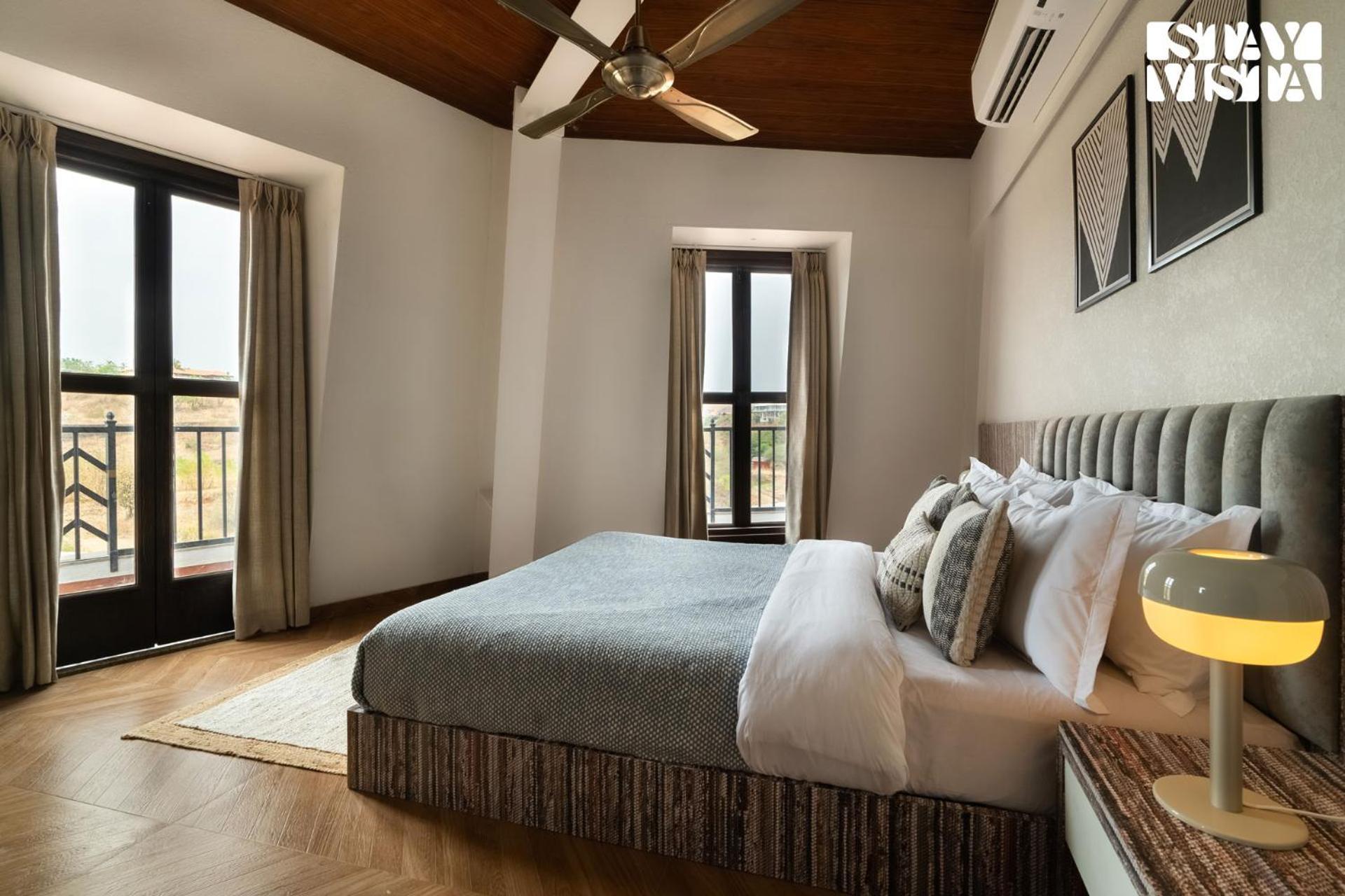 Stayvista's Cerenity Castle - Lakeside Haven With Hill-view, Terrace & Indoor Entertainment Villa Nashik