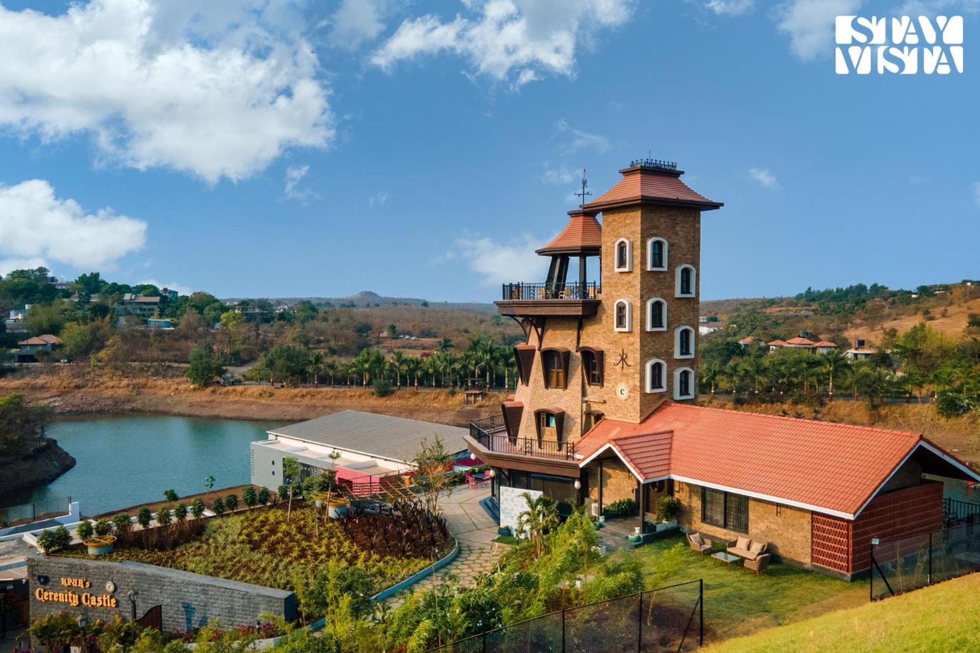 Villa Stayvista's Cerenity Castle - Lakeside Haven With Hill-view, Terrace & Indoor Entertainment Nashik