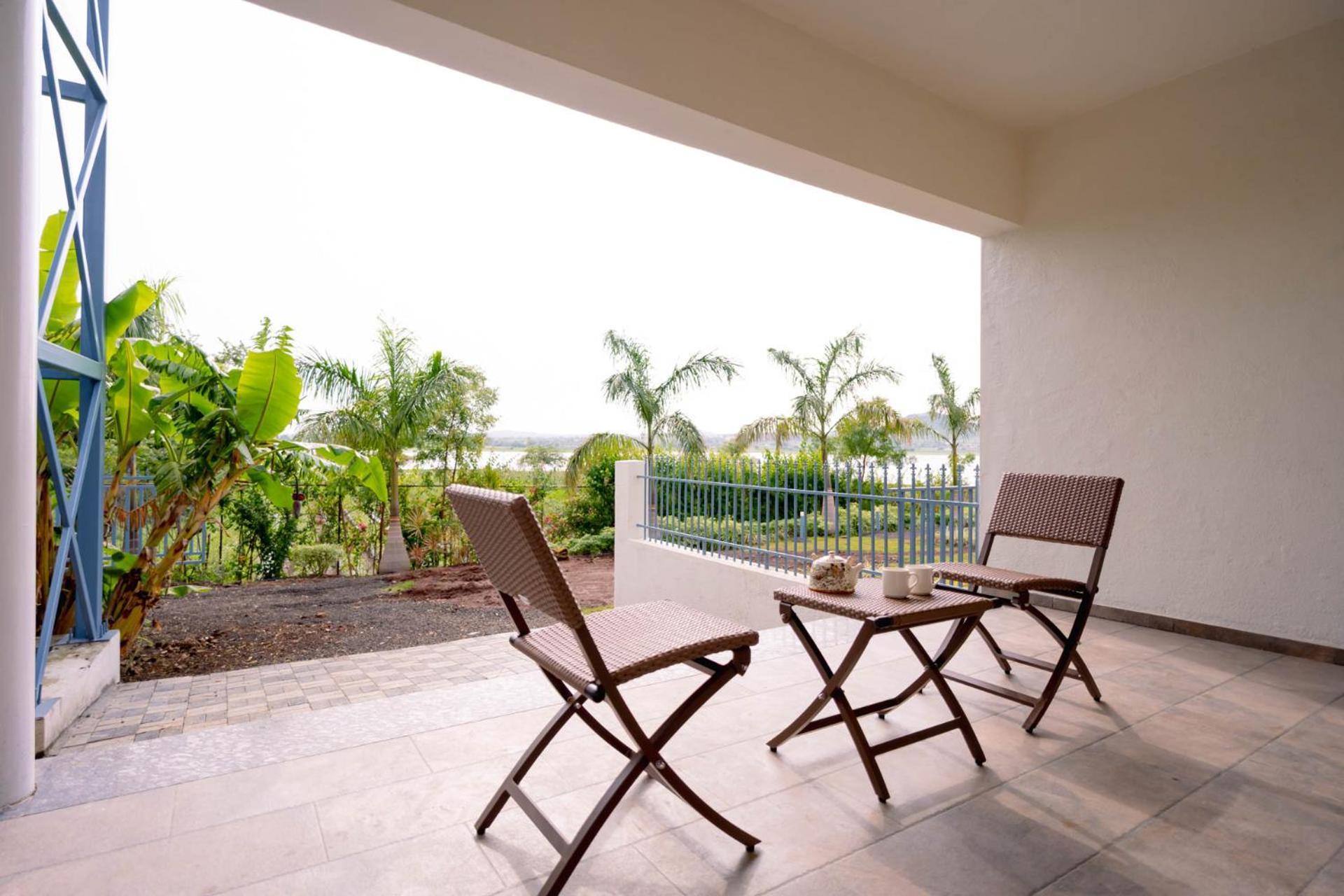 Stayvista's Eva - Lakeside Luxury With Modern Decor, Pool & Expansive Lawn - Near Sula